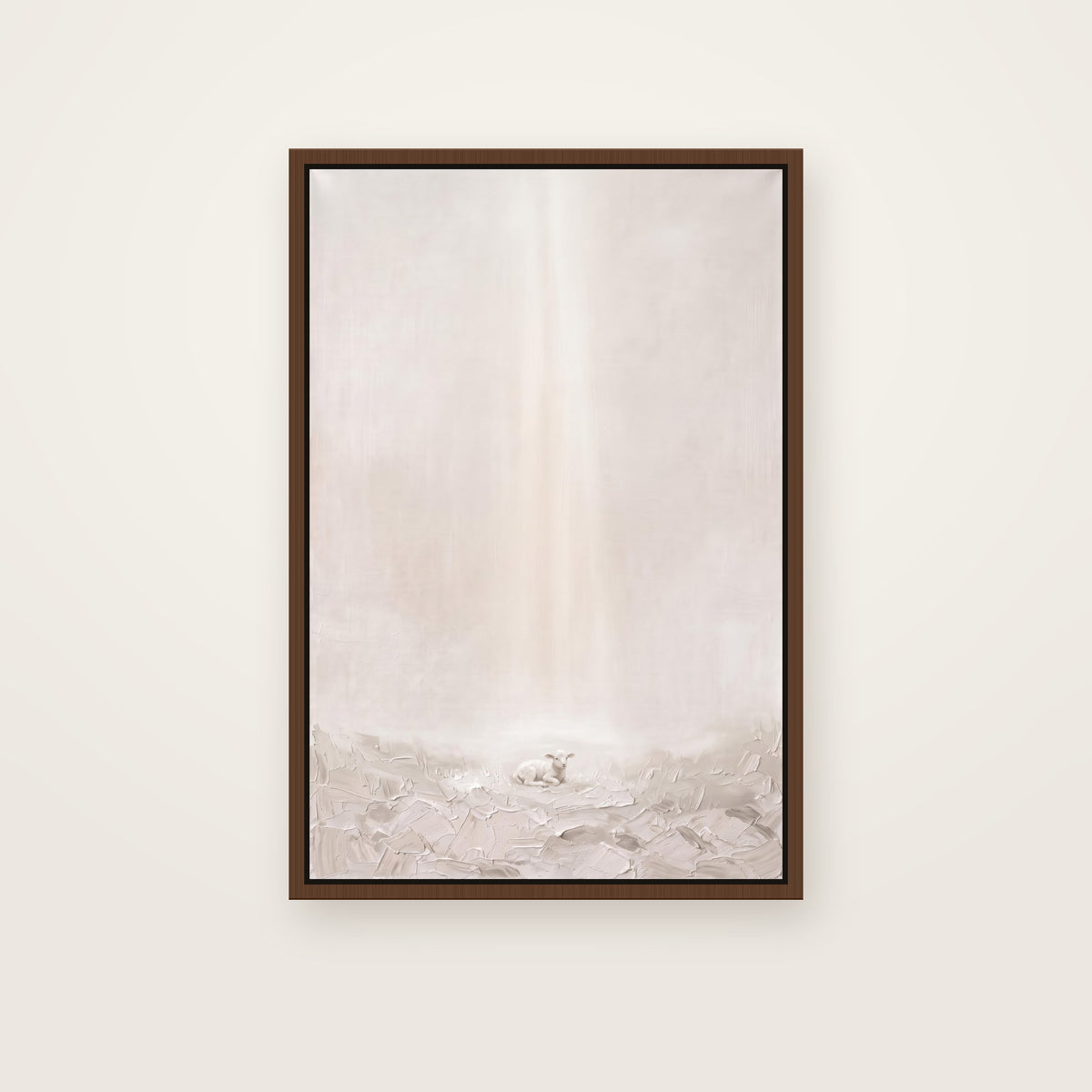 Behold the Lamb Christian wall art framed canvas print in a brown floating frame, showing a small lamb resting in soft grass under a gentle beam of light