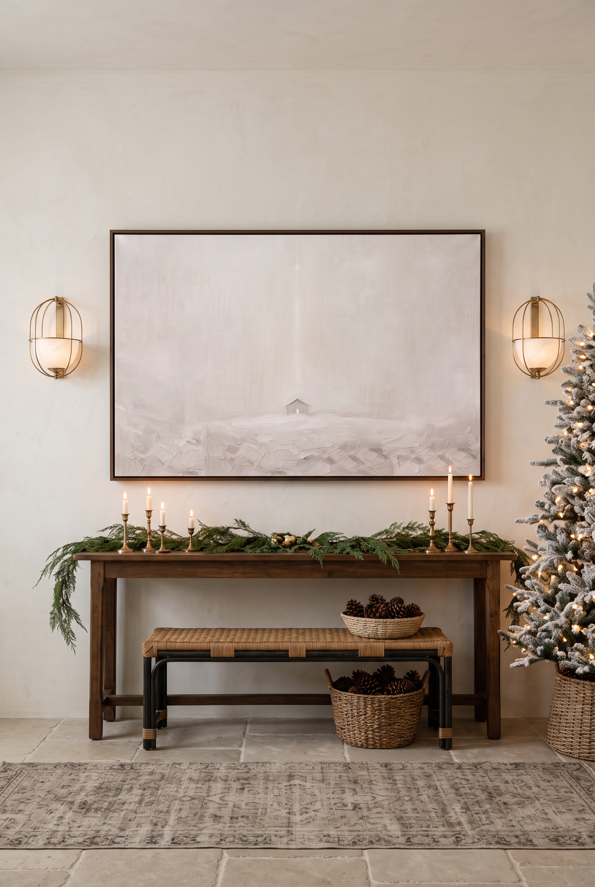 The Quiet Night framed canvas above an entry console with garland, candles and a flocked tree